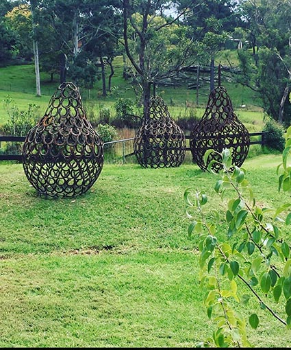 Metal garden sculpture displayed at Village markets